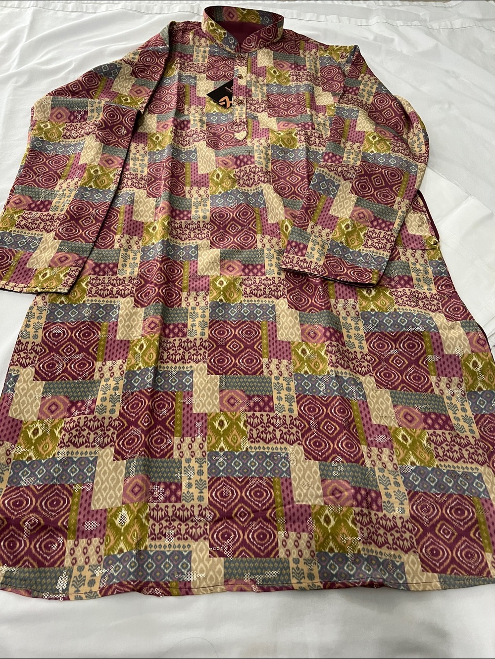 Multicolor Men Kurta with white pants. Material is soft.